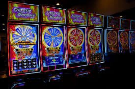 Bangladesh adults reviewing casino-style slot themes on a phone screen